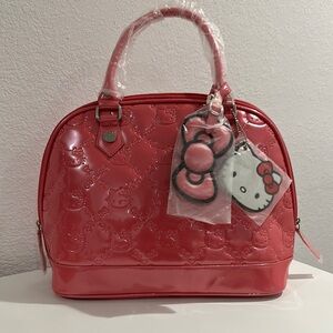 Sanrio Pink Satchel with Glossy Finish and Character Charm